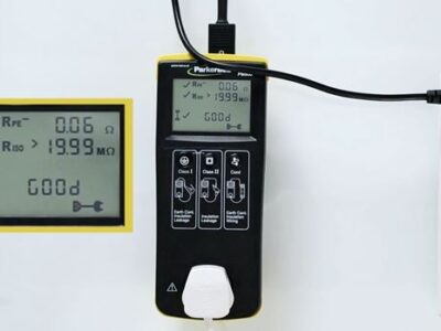 PAT tester being used on an extension lead
